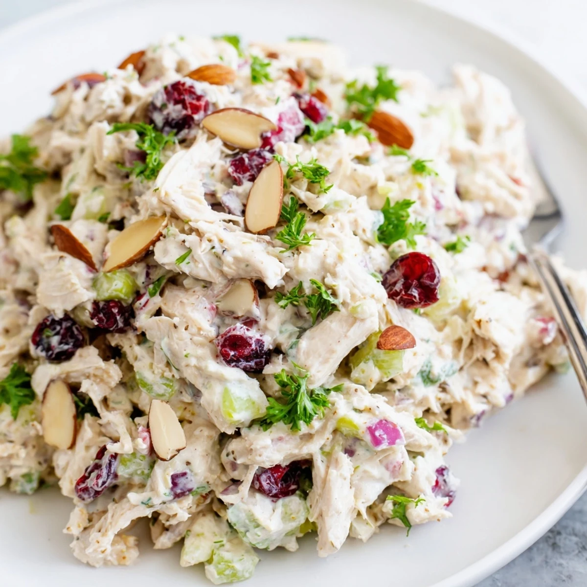 Light and protein-packed Greek yogurt rotisserie chicken salad with colorful diced vegetables and creamy dressing