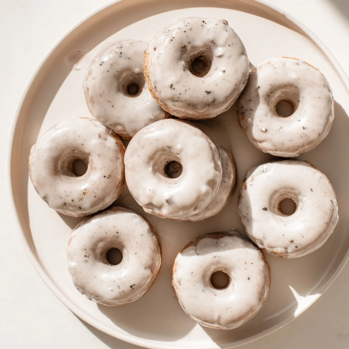 Golden glazed Earl Grey mochi donuts with a chewy texture and sweet tea-infused coating