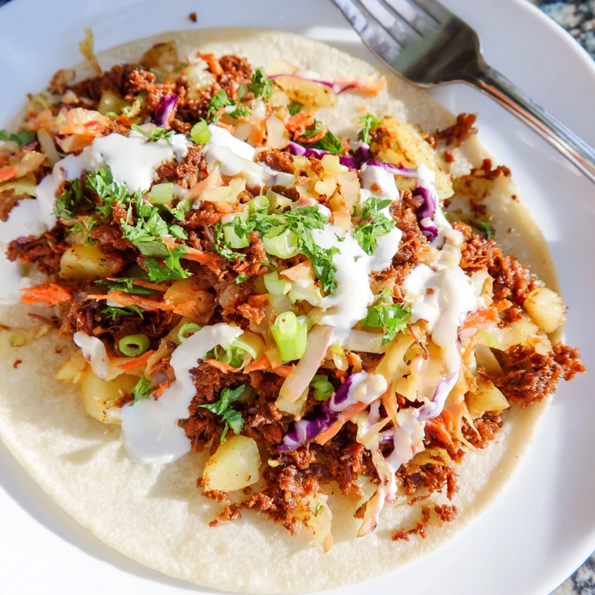 Warm flour tortilla filled with tender corned beef, crispy golden potatoes, and tangy cabbage slaw