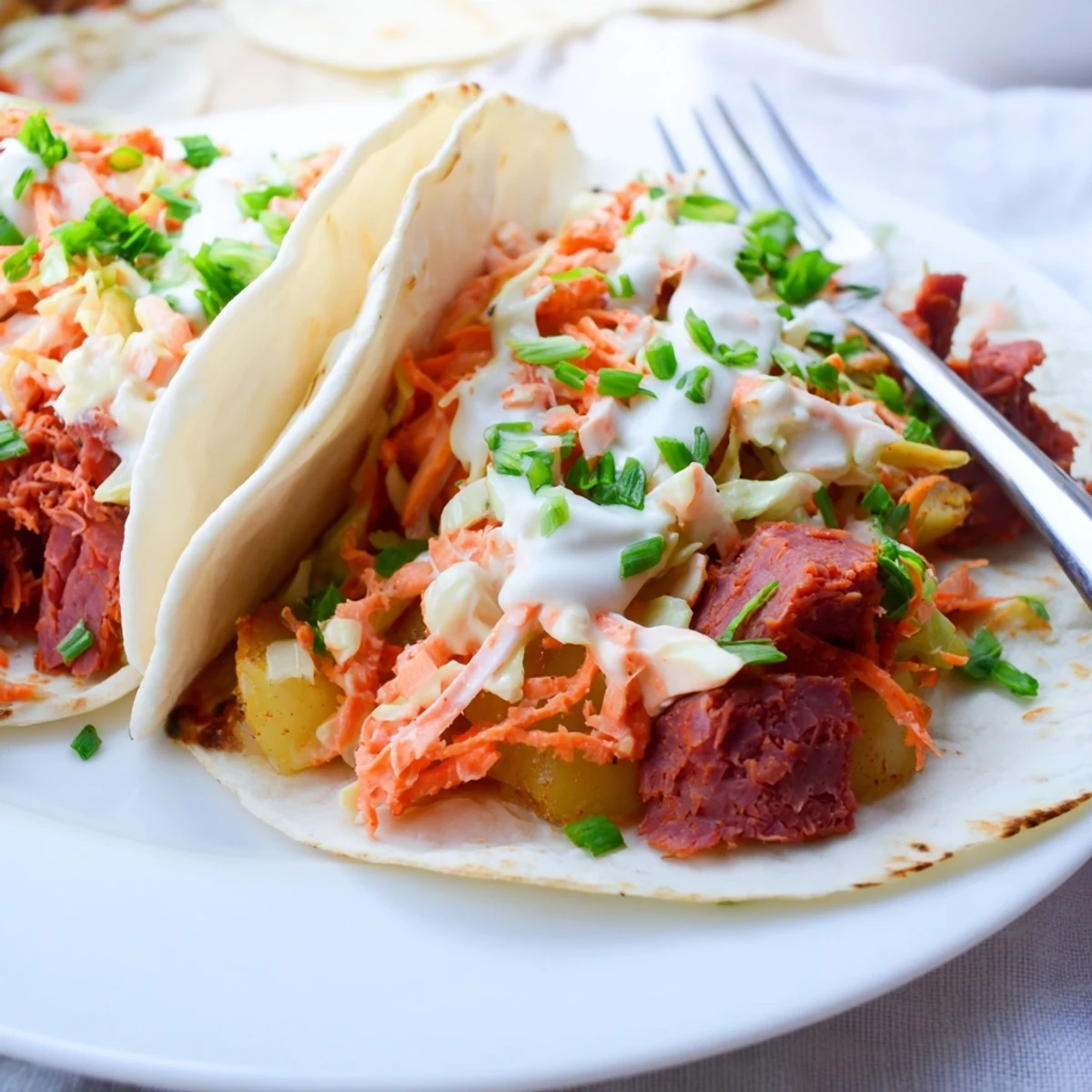 Homemade Irish taco recipe showcasing crisp tortillas wrapped around savory meat and fresh vegetable slaw