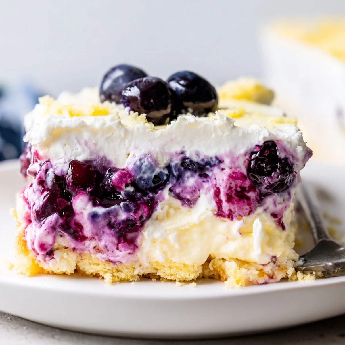 Chilled Lemon Blueberry Lasagna Recipe layered with zesty cream and juicy berries