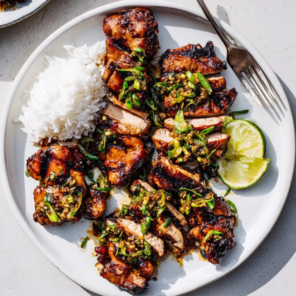 Juicy Grilled Vietnamese Chicken glazed with caramelized marinade, cilantro garnish