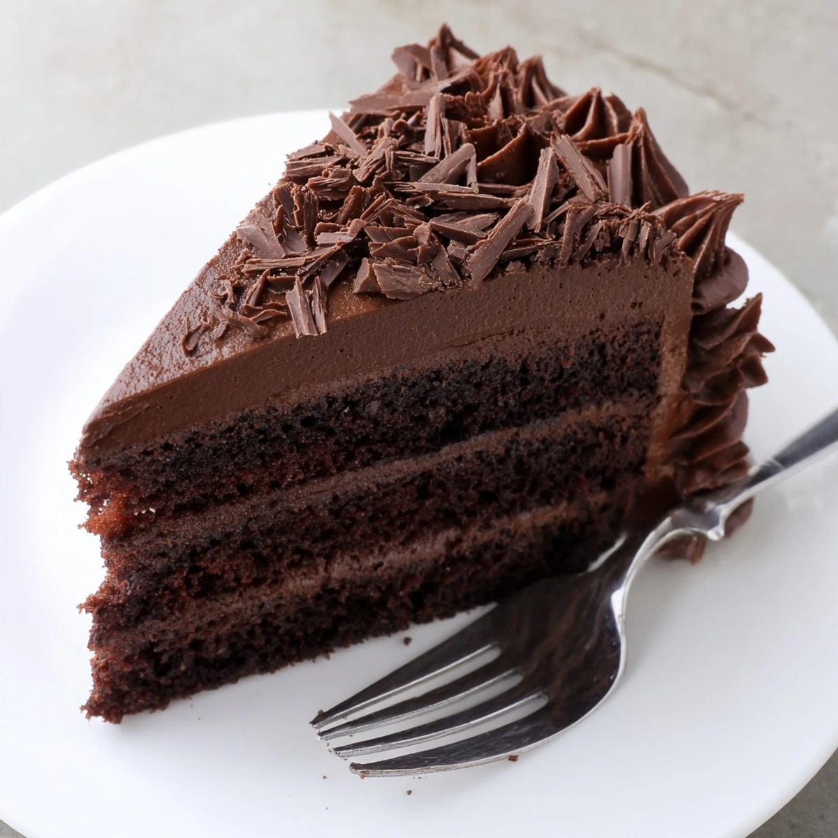 Chocolate Cake Recipe cooled on wire rack, ready to frost and serve