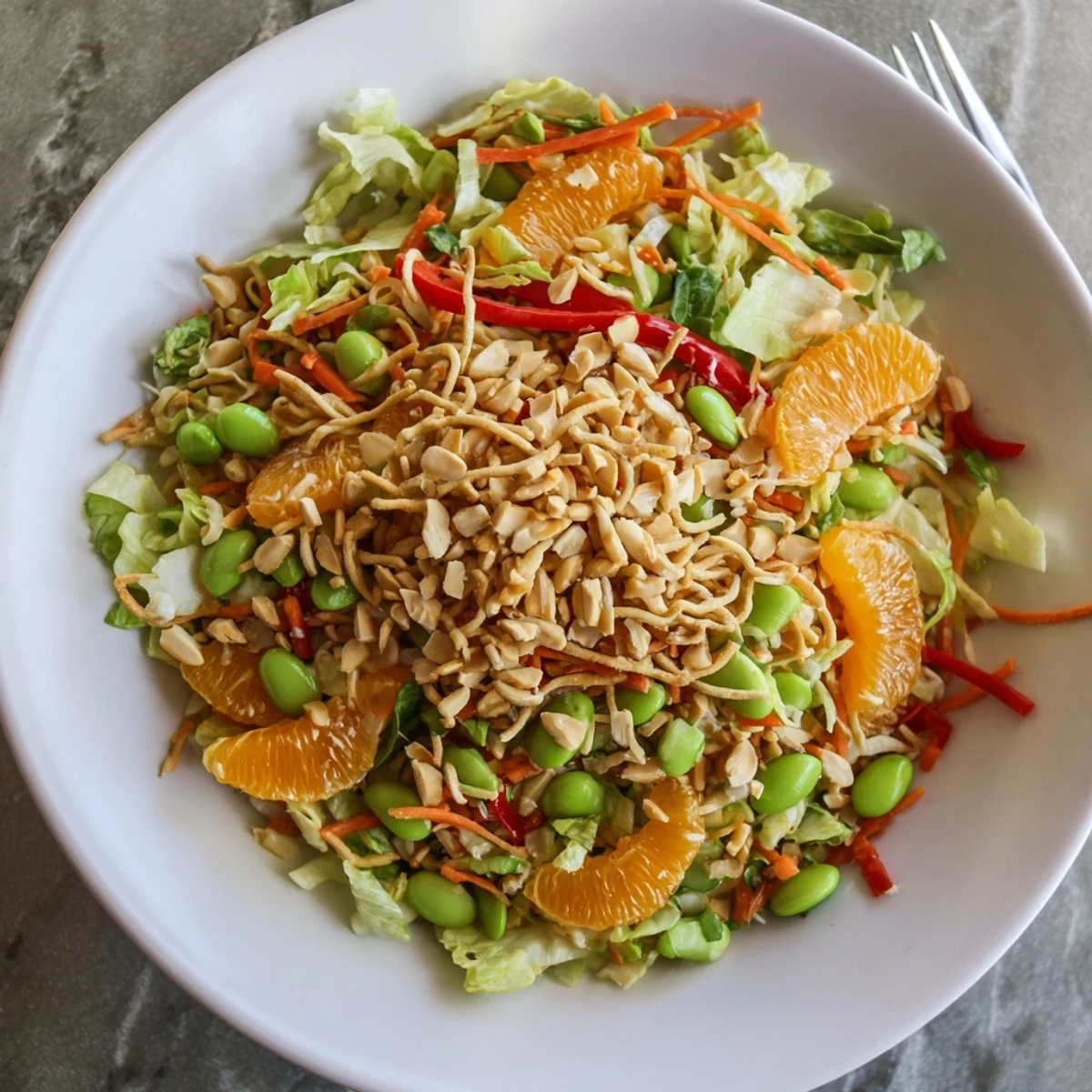 Crisp greens and mandarin oranges tossed in Mandarin Sesame Crunch Salad with toasted almonds